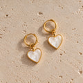 The Cora Gold Heart Huggie Earrings Nacre & Atlas