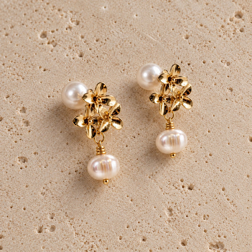 The Fiona gold floral pearl drop earrings by Nacre & Atlas