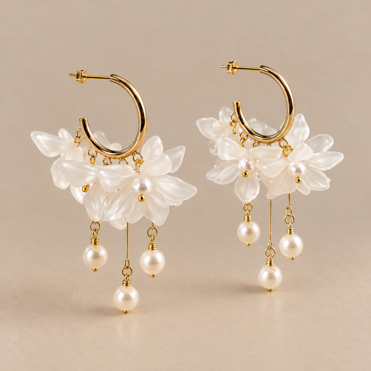 The Flora ivory floral pearl drop earrings by Nacre & Atlas