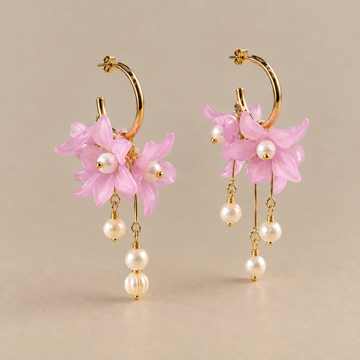 The Flora pink floral pearl drop earrings by Nacre & Atlas