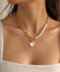The Mable pearl and gold-tone chain necklace with iridescent heart charm by Nacre & Atlas